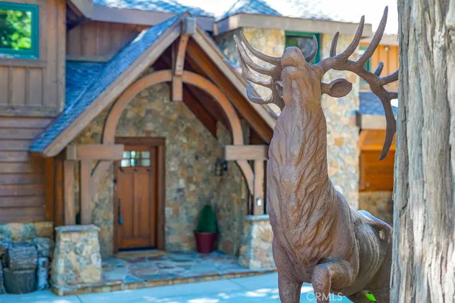 a view of a house with a bench