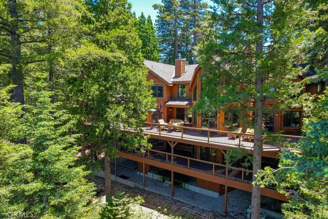 a kitchen with a stove and a wooden cabinets