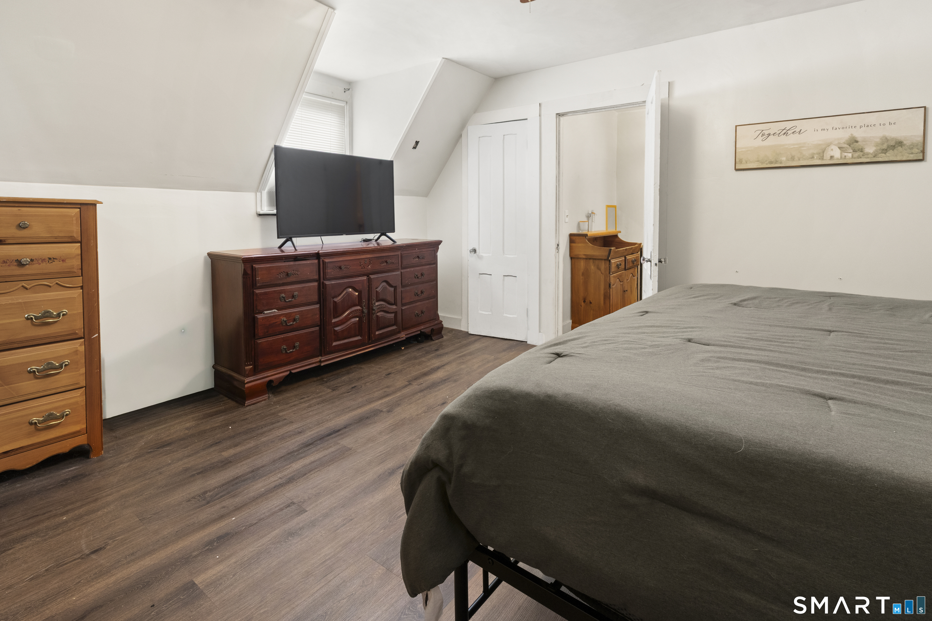 47 Broad Street Killingly, CT 06239 - Photo 28 of 33 a bedroom with a bed and furniture