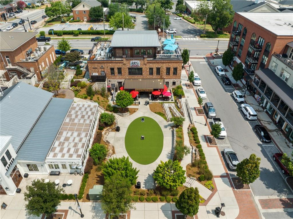 316 Treble Way Alpharetta, GA 30009 - Photo 68 of 71 an aerial view of a house with swimming pool and outdoor seating