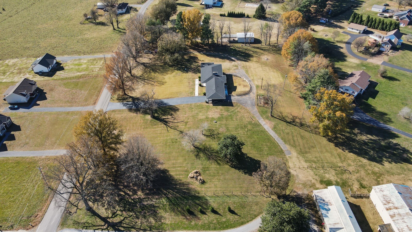 676 Ferguson Hill Road Lafayette, TN 37083 - Photo 86 of 89 an aerial view of residential houses with outdoor space