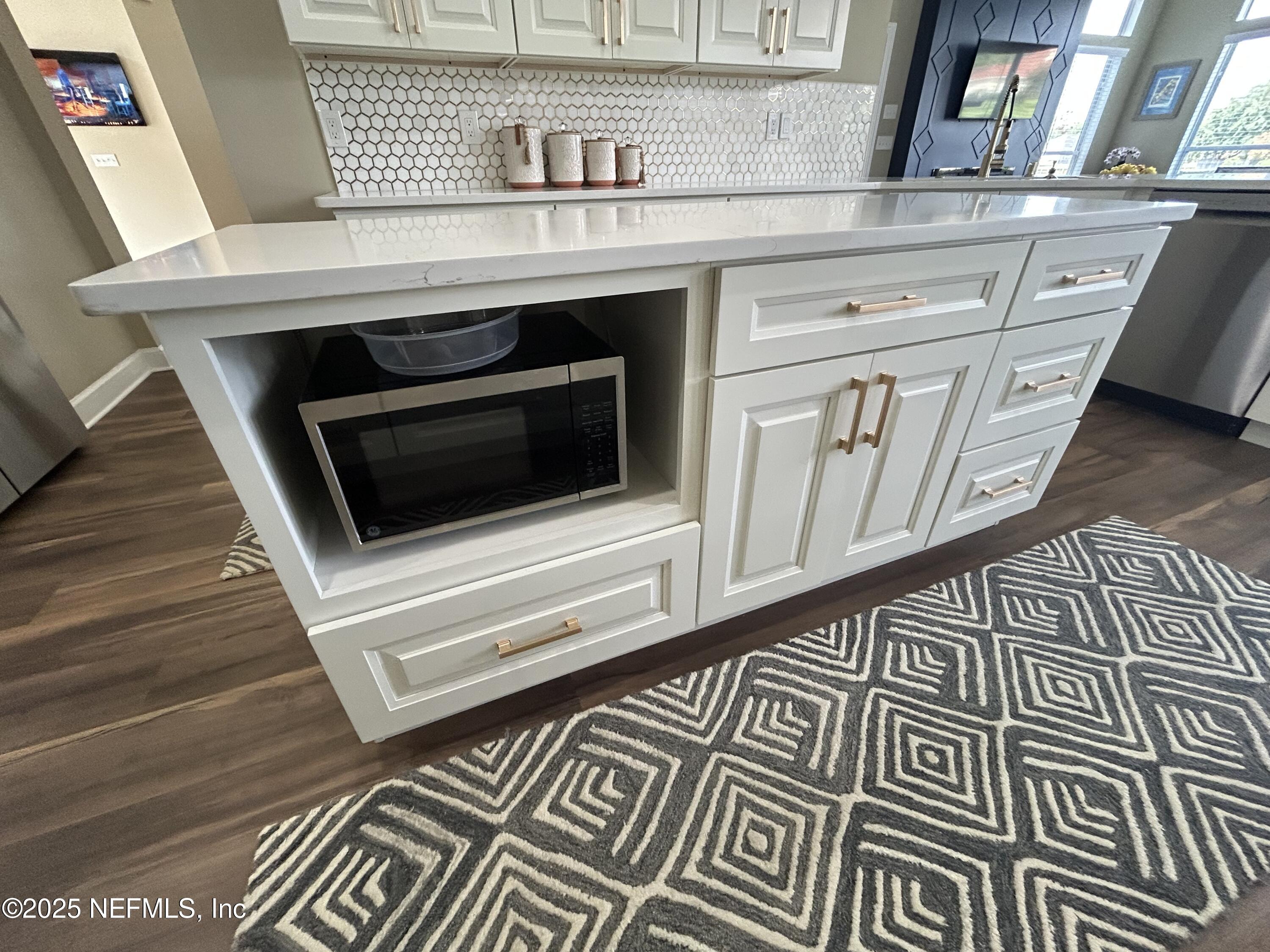 1764 Eagle Watch Drive Fleming Island, FL 32003 - Photo 12 of 41 a stove top oven sitting inside of a kitchen