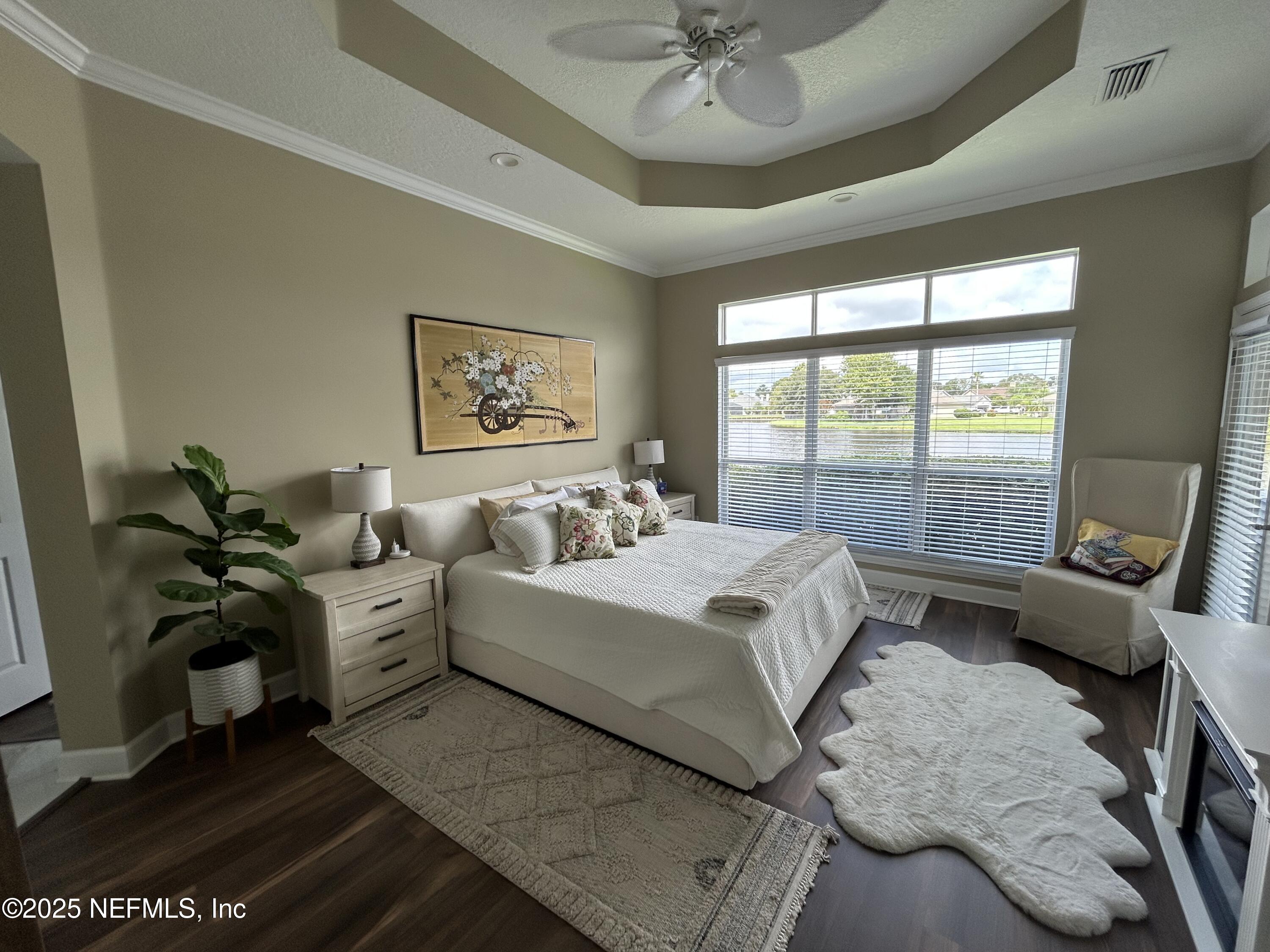 1764 Eagle Watch Drive Fleming Island, FL 32003 - Photo 19 of 41 a bed room with a bed and a couch