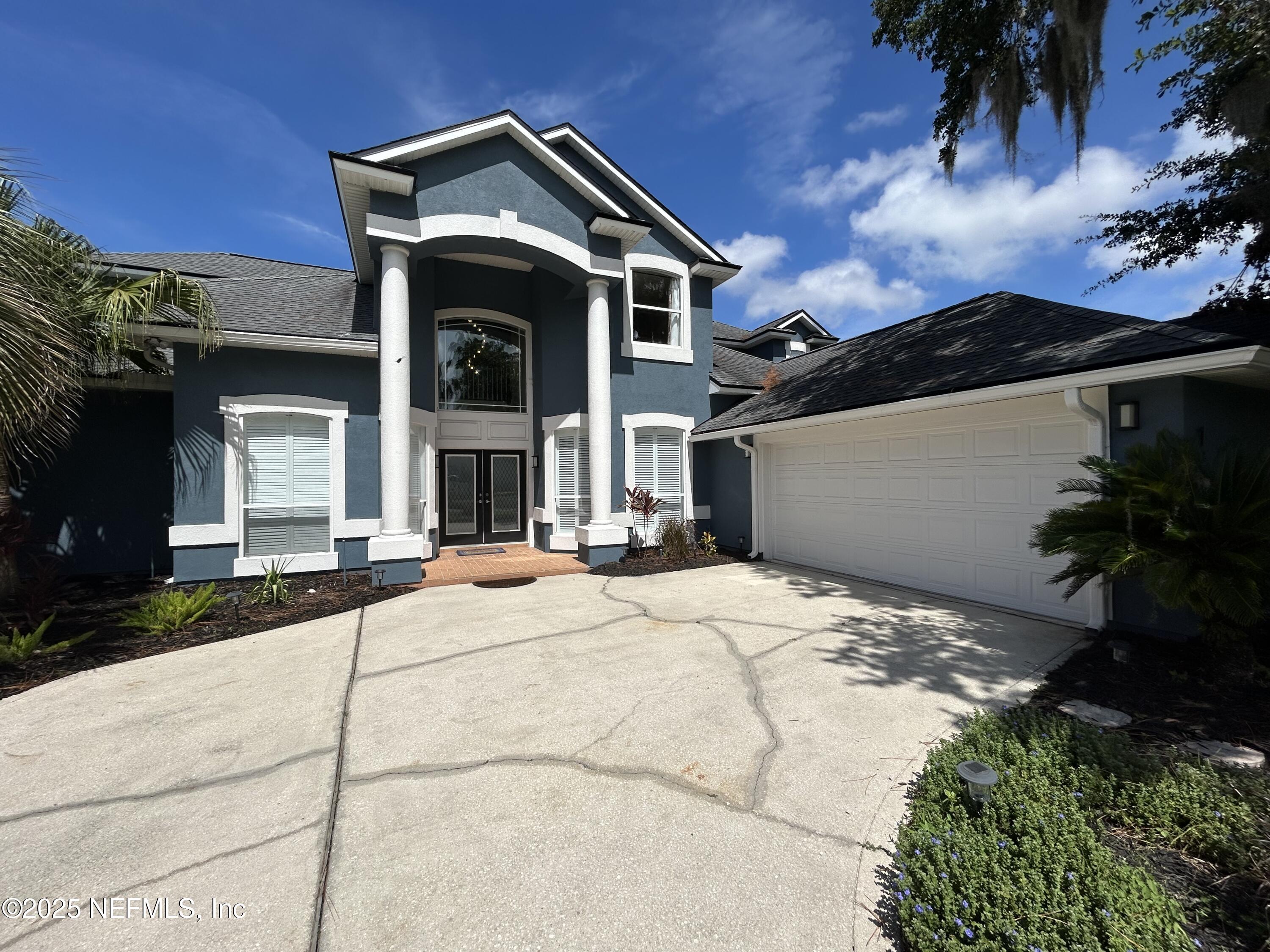 1764 Eagle Watch Drive Fleming Island, FL 32003 - Photo 2 of 41 a house with a outdoor space
