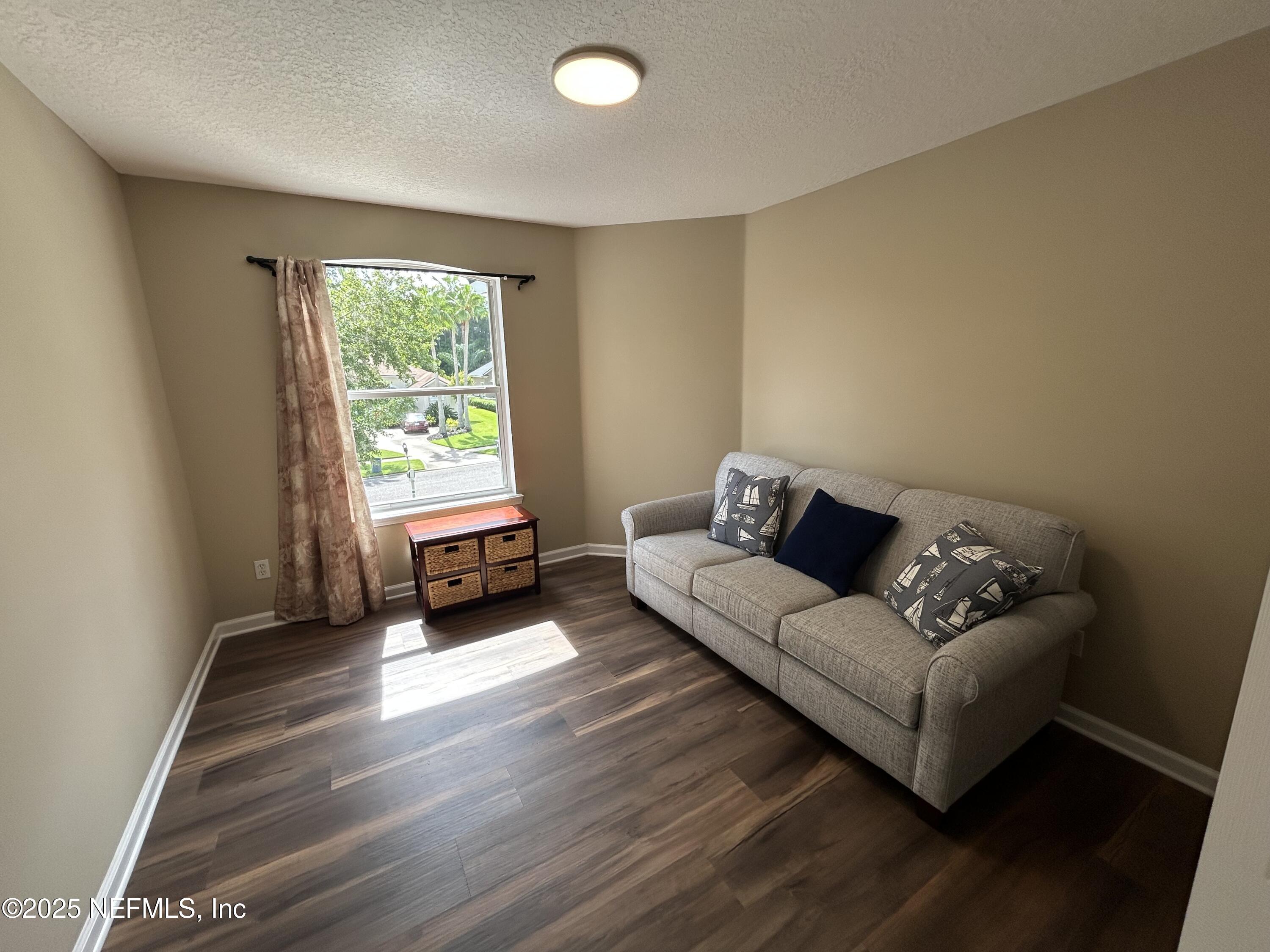 1764 Eagle Watch Drive Fleming Island, FL 32003 - Photo 33 of 41 a living room with furniture and a window