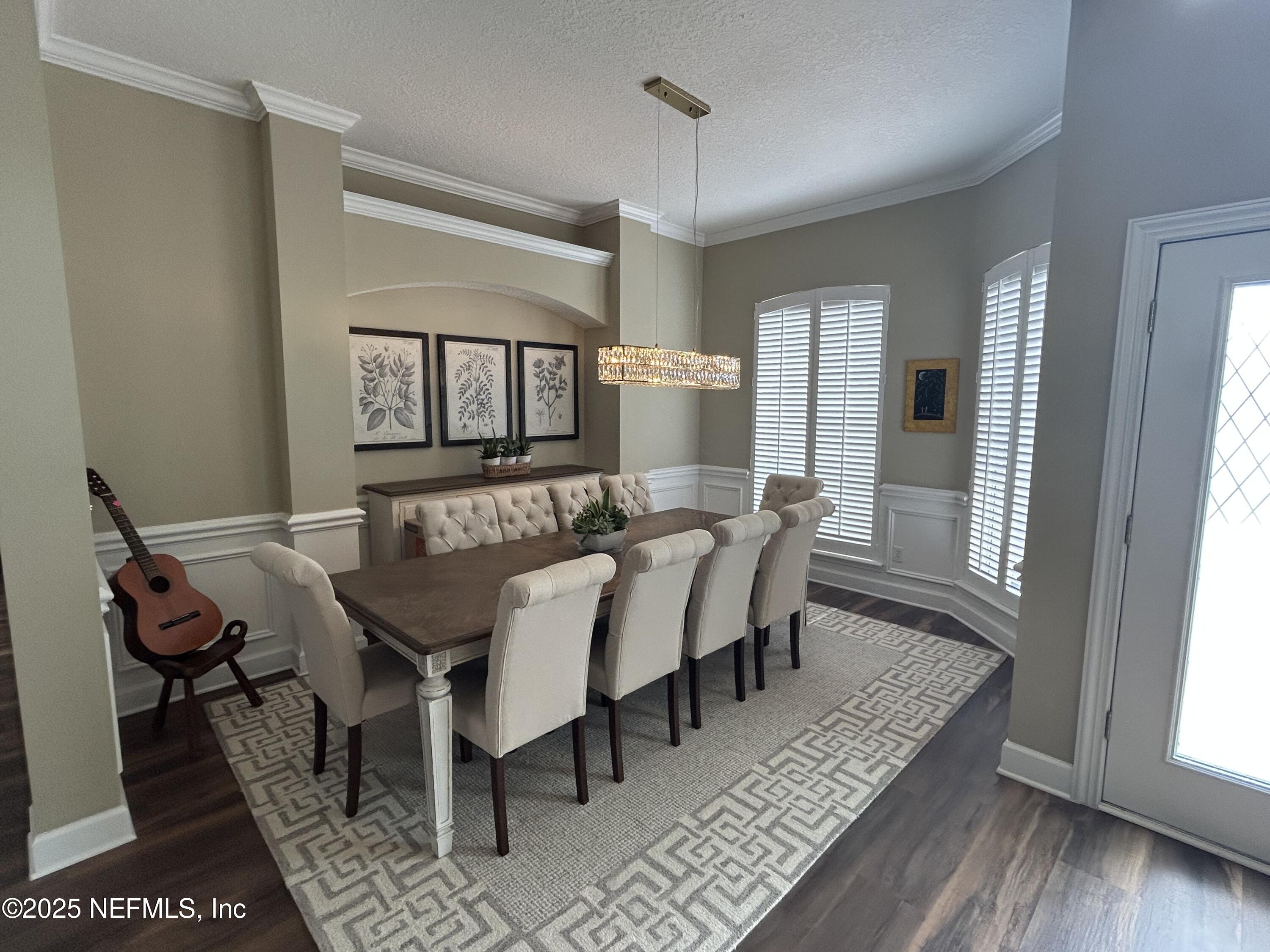 1764 Eagle Watch Drive Fleming Island, FL 32003 - Photo 4 of 41 a view of a dining room with furniture and window