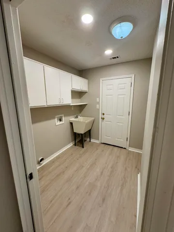 a view of gallery with windows