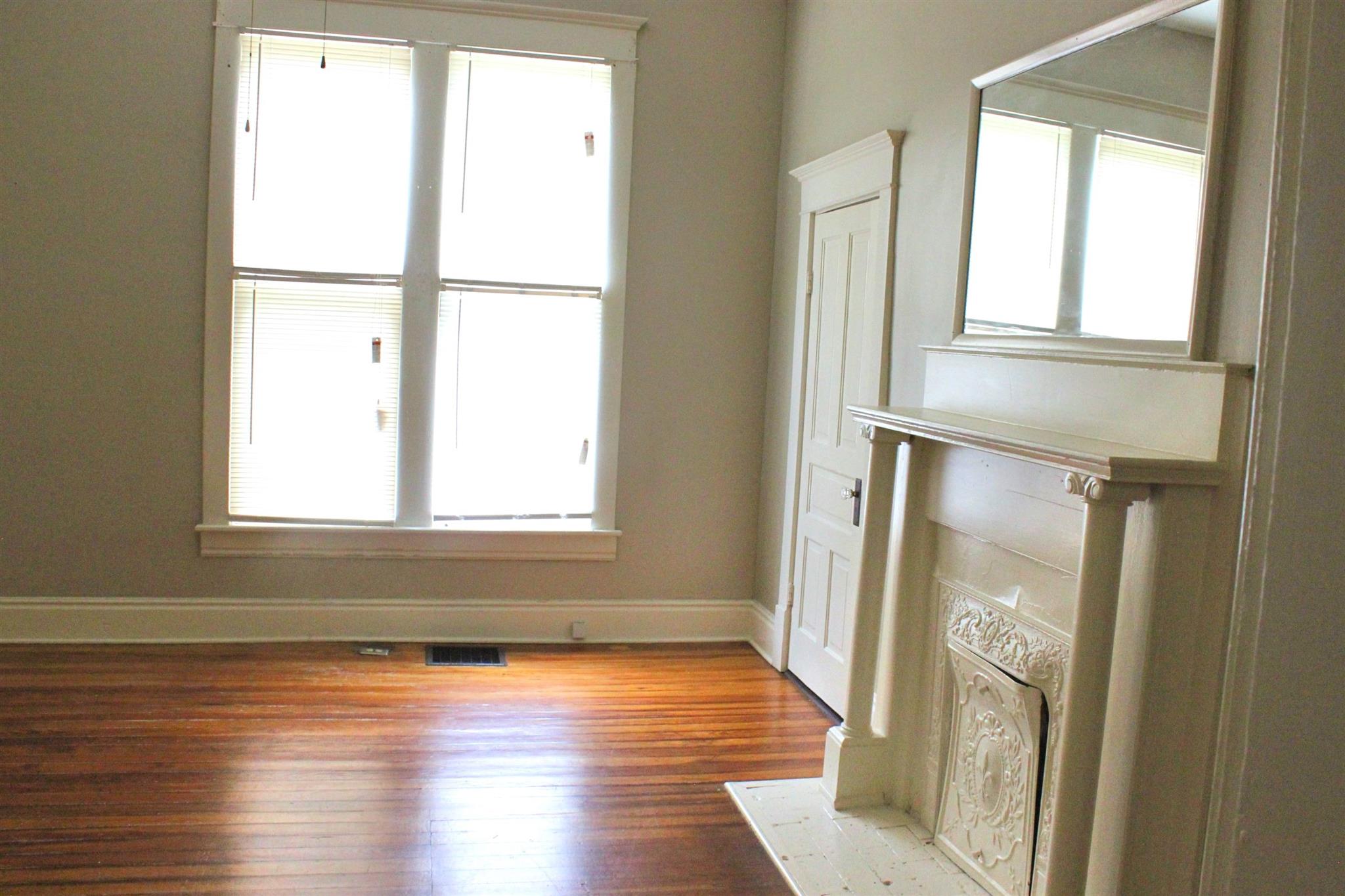 322 North Oak Street Springfield, TN 37172 - Photo 8 of 14 a view of empty room with wooden floor and fan