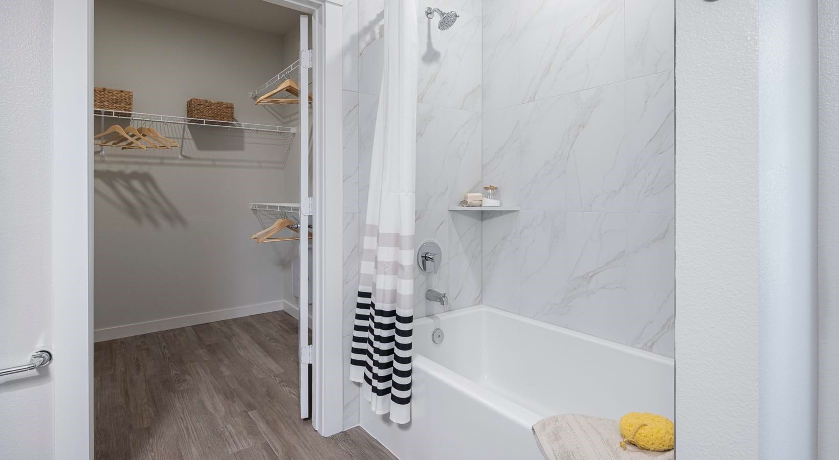 1505 Oliver Street, Unit 413 Houston, TX 77007 - Photo 17 of 19 a bathroom with a bathtub and shower