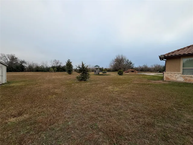 a view of yard with ocean view