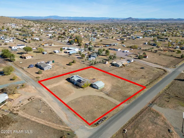 an aerial view of a pool table and chairs