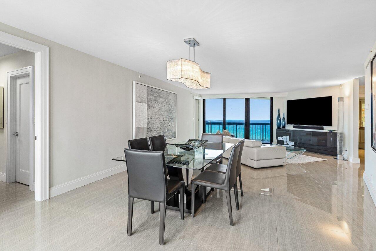 4545 North Ocean Boulevard, Unit 18D Boca Raton, FL 33431 - Photo 5 of 28 a view of a dining room with furniture window and wooden floor