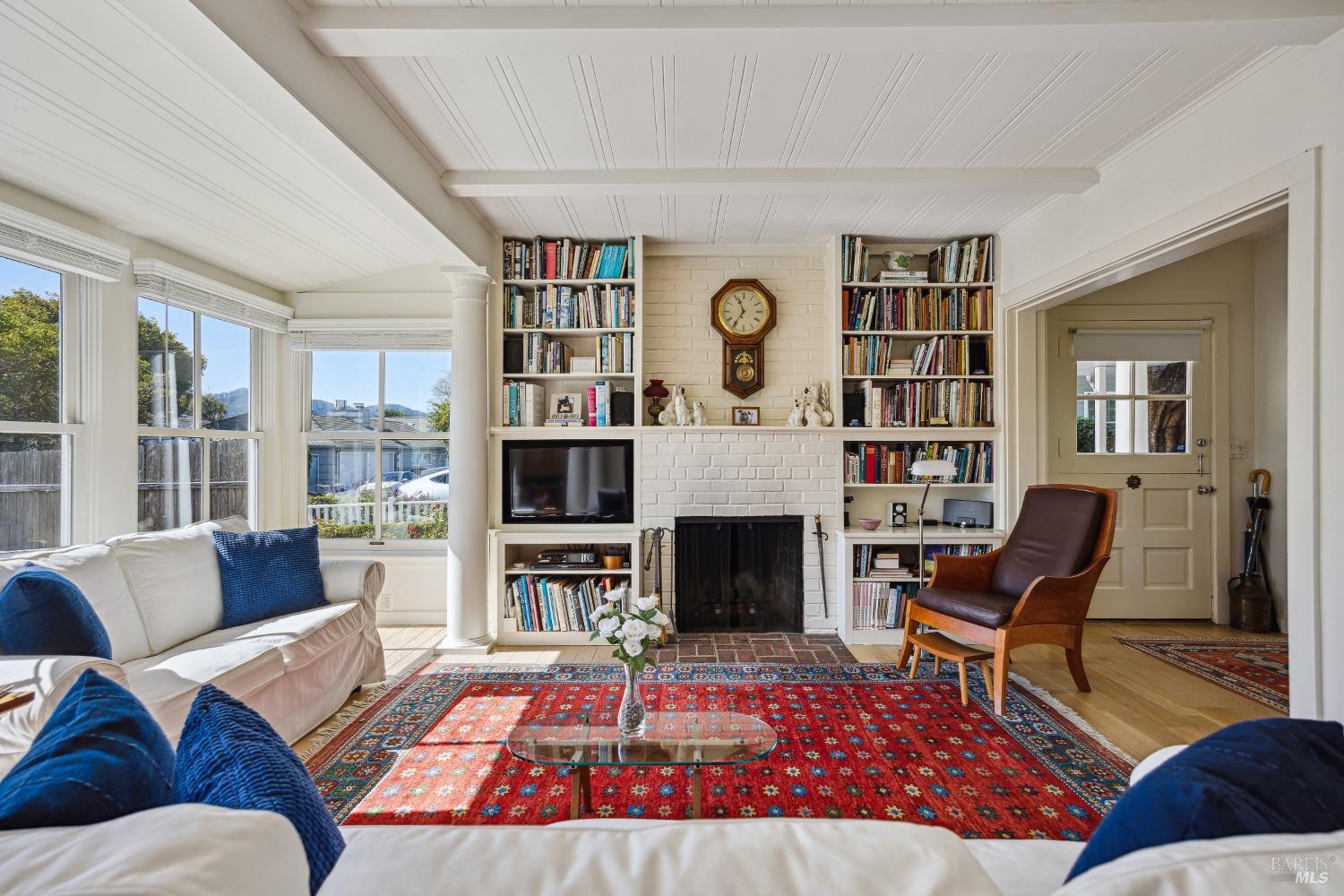 3 Lagoon Road Belvedere, CA 94920 - Photo 1 of 1 a living room with furniture and a fireplace