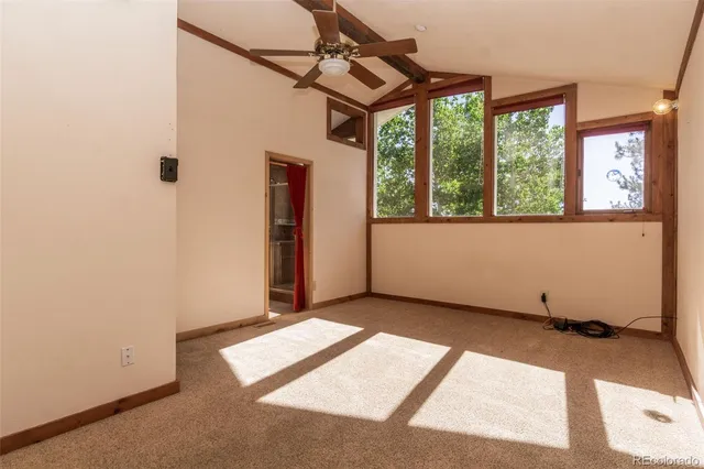 a view of a room with a large window