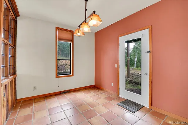 a view of a room with a chandeliers