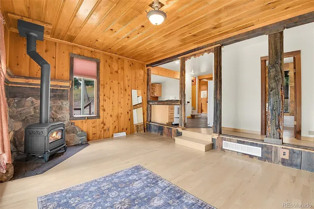 a room with gym equipment and a large window