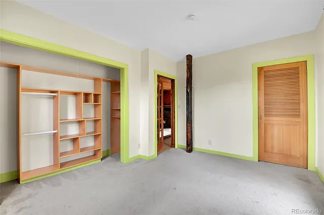 a view of a livingroom with a staircase