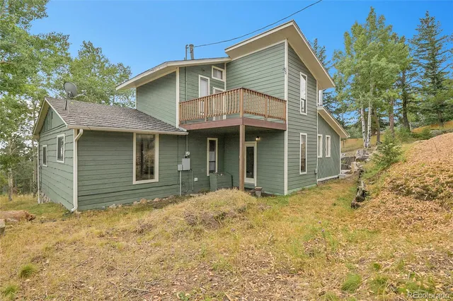 a view of a yard with trees
