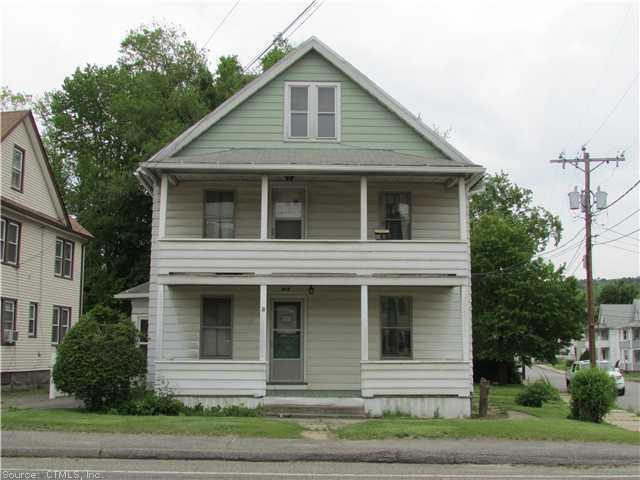 a view of small white house