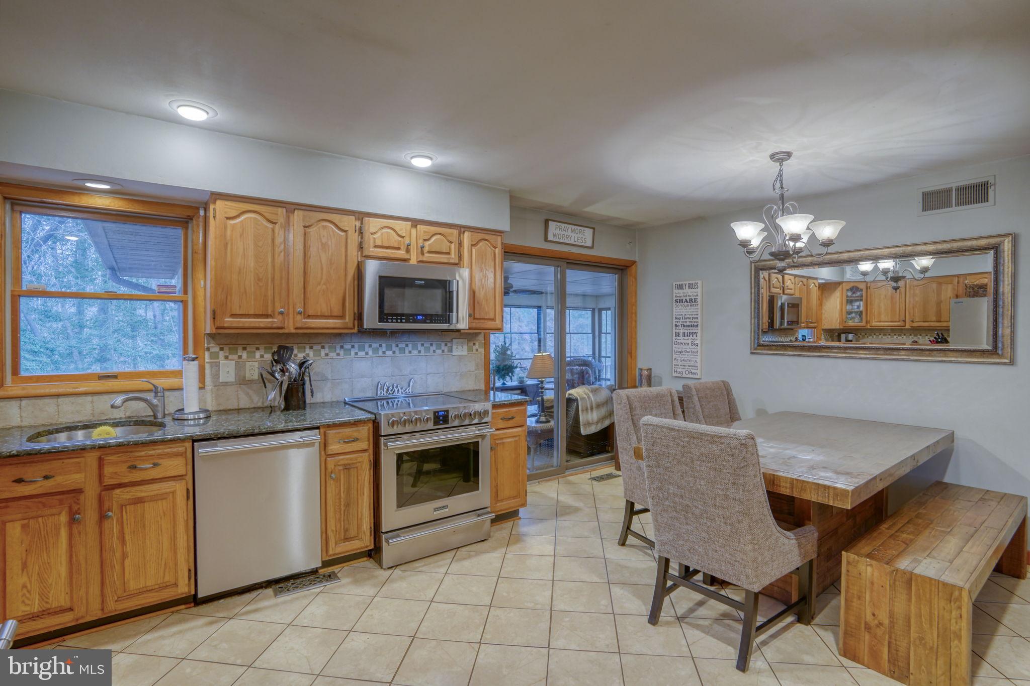 31674 Hickory Manor Road Frankford, DE 19945 - Photo 20 of 53 a kitchen with cabinets a sink and appliances