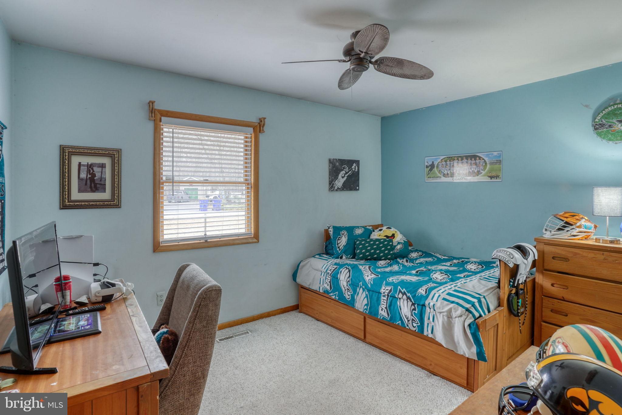 31674 Hickory Manor Road Frankford, DE 19945 - Photo 34 of 53 a bedroom with bed and a window