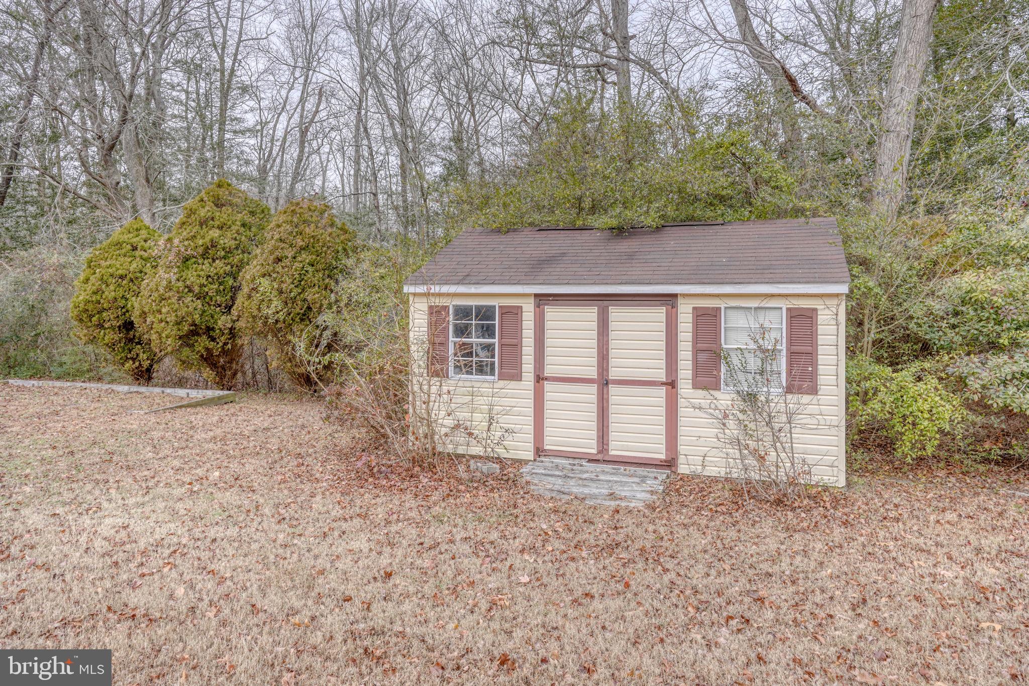 31674 Hickory Manor Road Frankford, DE 19945 - Photo 45 of 53 front view of a house with a yard