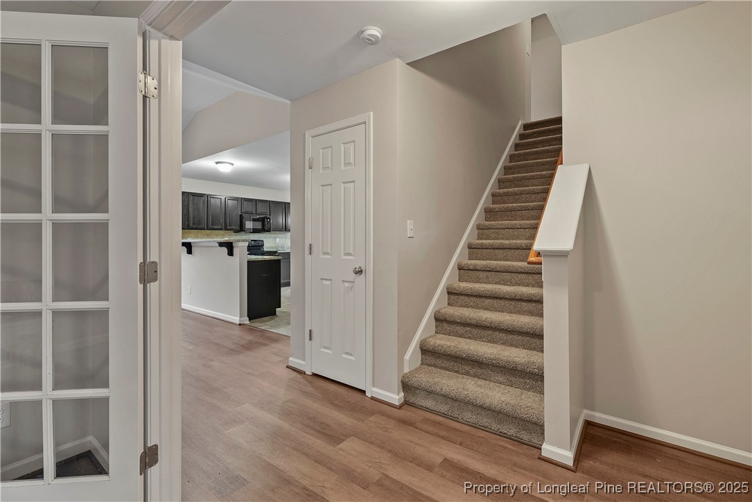 720 Cape Fear Road Raeford, NC 28376 - Photo 18 of 35 a view of a hallway with wooden floor and entryway