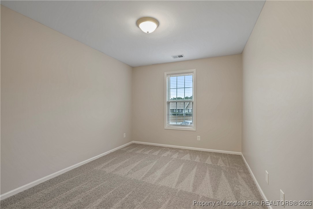 720 Cape Fear Road Raeford, NC 28376 - Photo 20 of 35 an empty room with a window