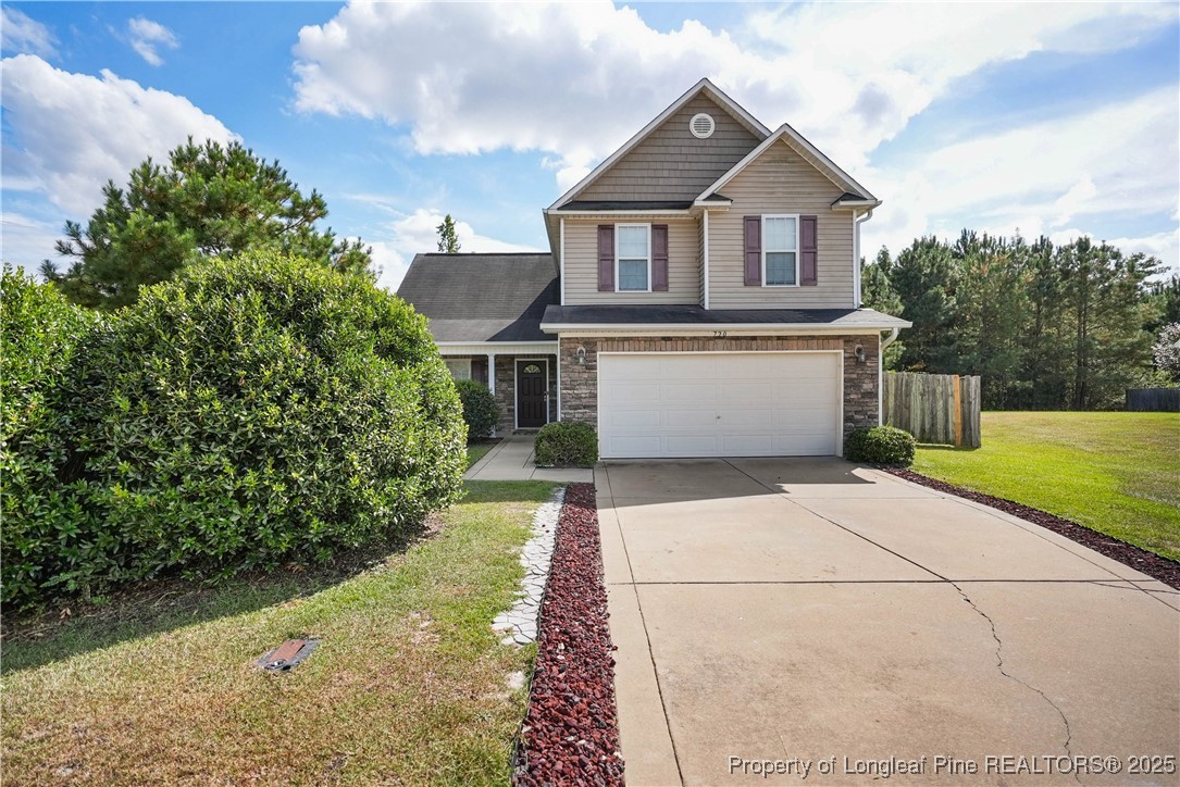 720 Cape Fear Road Raeford, NC 28376 - Photo 2 of 35 a front view of a house with a yard