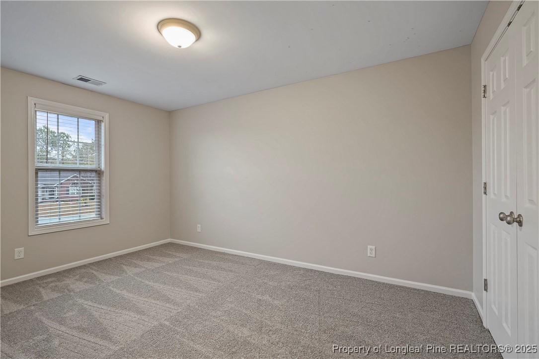 720 Cape Fear Road Raeford, NC 28376 - Photo 29 of 35 an empty room with a window
