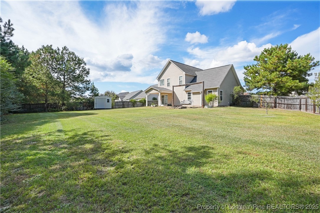 720 Cape Fear Road Raeford, NC 28376 - Photo 33 of 35 a front view of a house with a yard