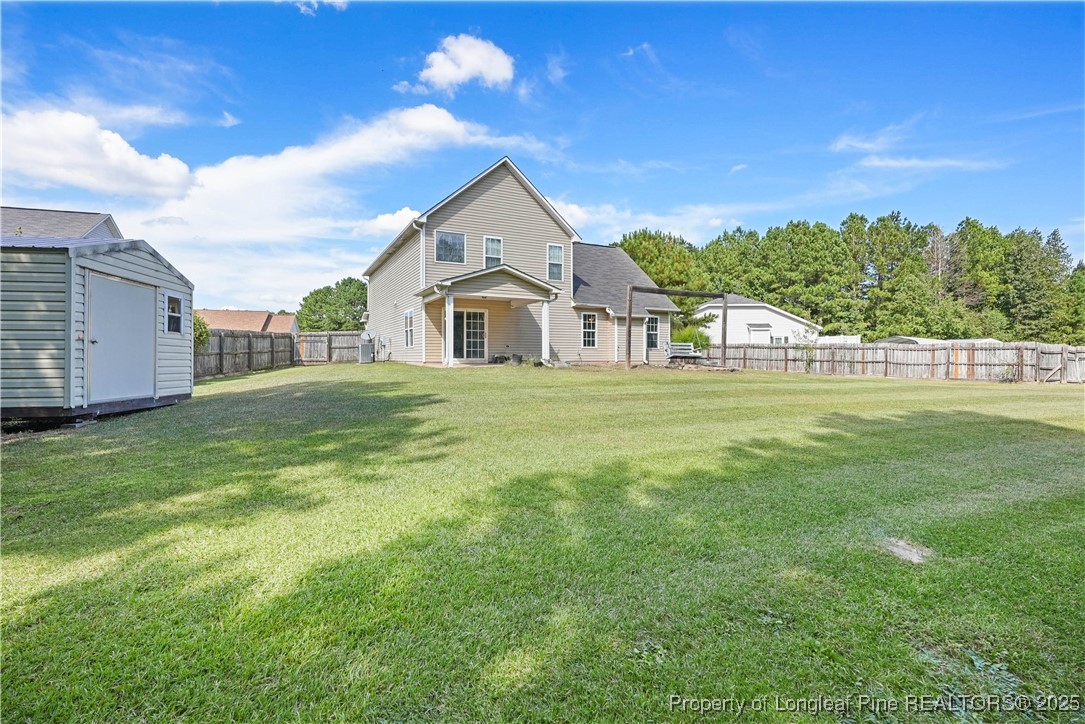720 Cape Fear Road Raeford, NC 28376 - Photo 34 of 35 a view of a house with a big yard
