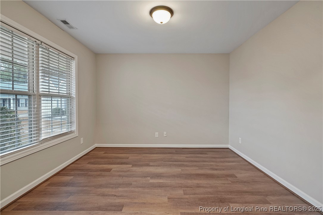 720 Cape Fear Road Raeford, NC 28376 - Photo 5 of 35 wooden floor in an empty room with a window