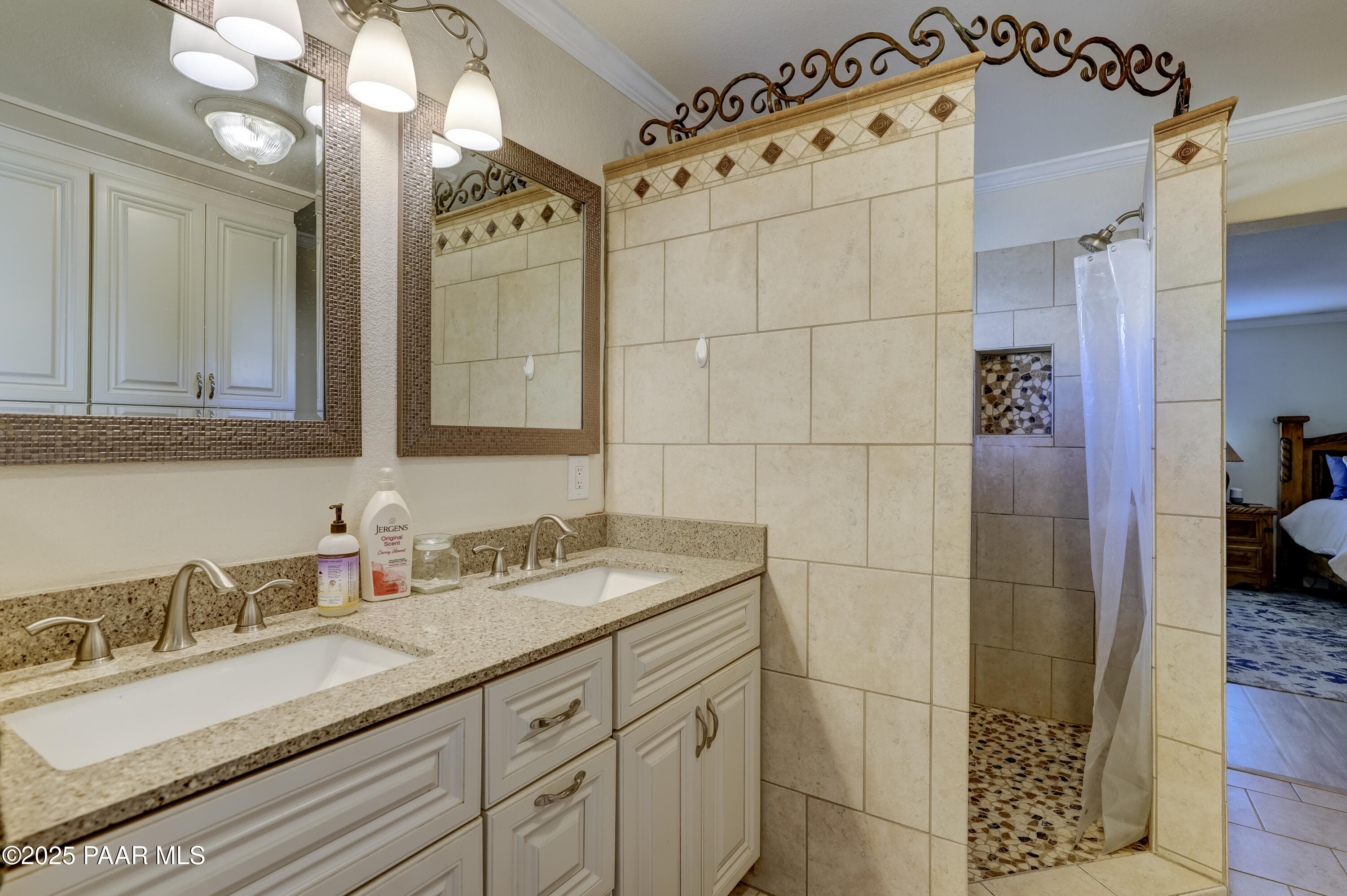 760 Yarber Wash Road Dewey, AZ 86327 - Photo 12 of 66 a bathroom with a sink and a mirror