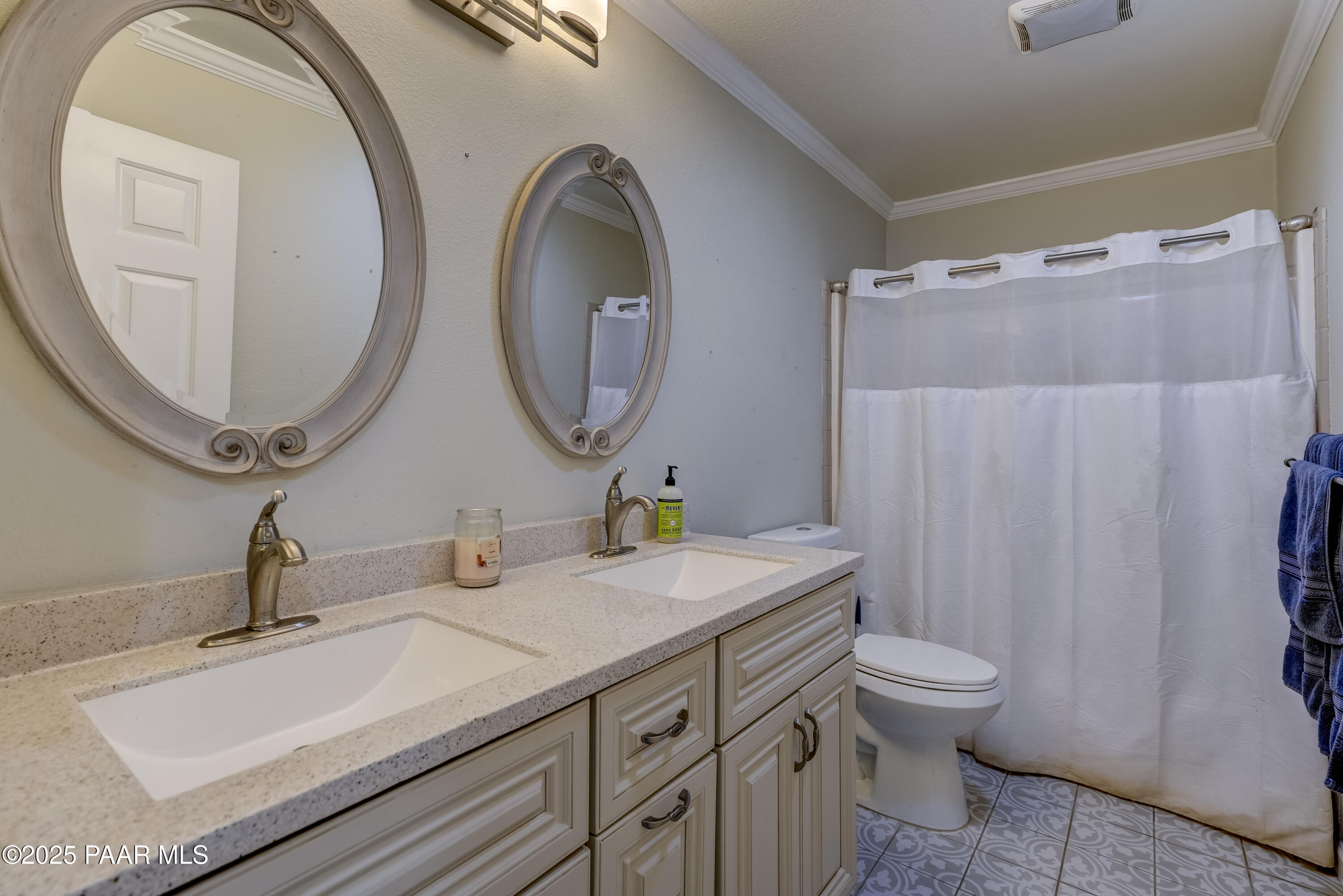 760 Yarber Wash Road Dewey, AZ 86327 - Photo 17 of 66 a bathroom with a granite countertop toilet sink and mirror
