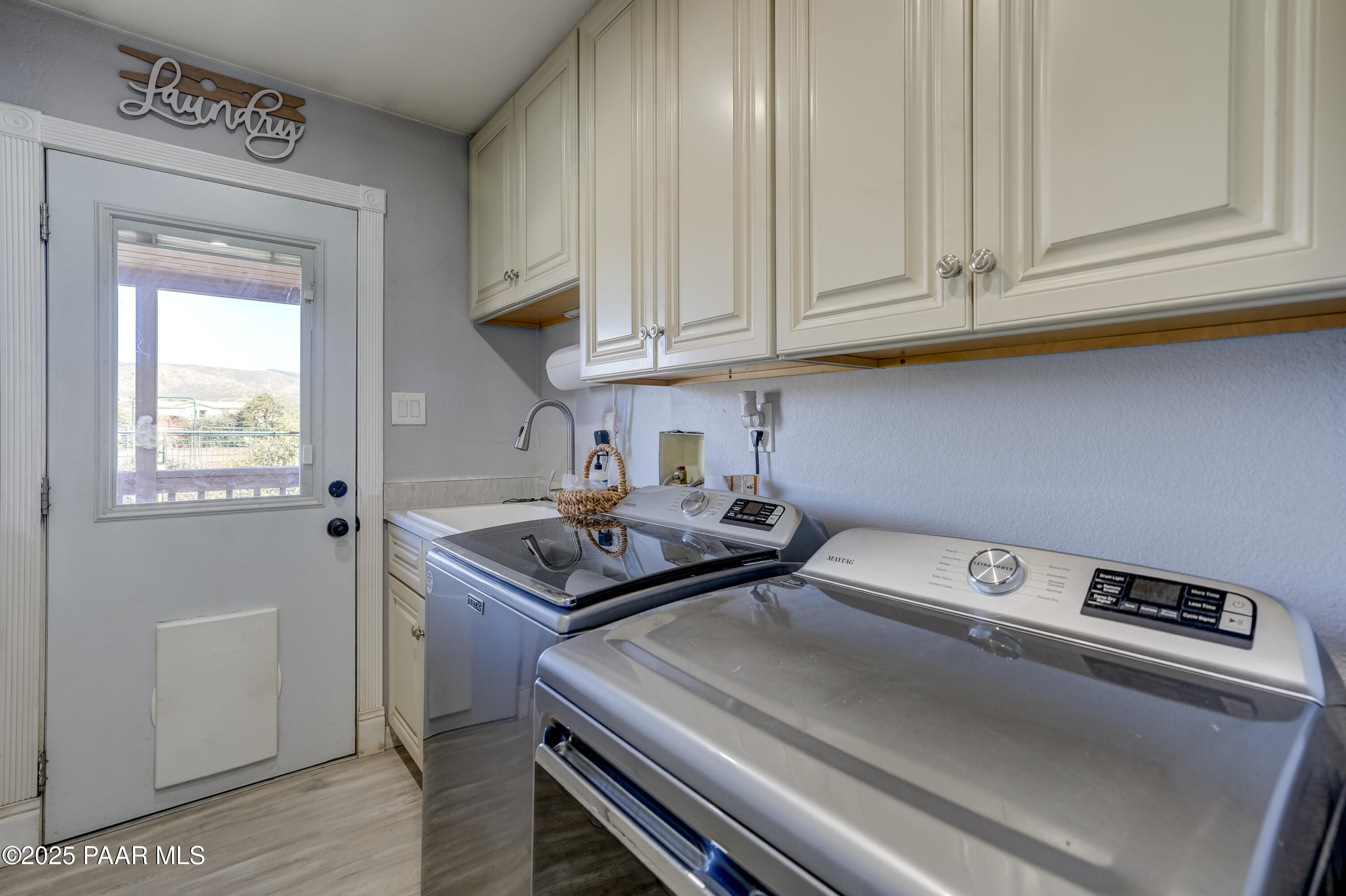 760 Yarber Wash Road Dewey, AZ 86327 - Photo 19 of 66 a kitchen with stainless steel appliances granite countertop a stove and a refrigerator