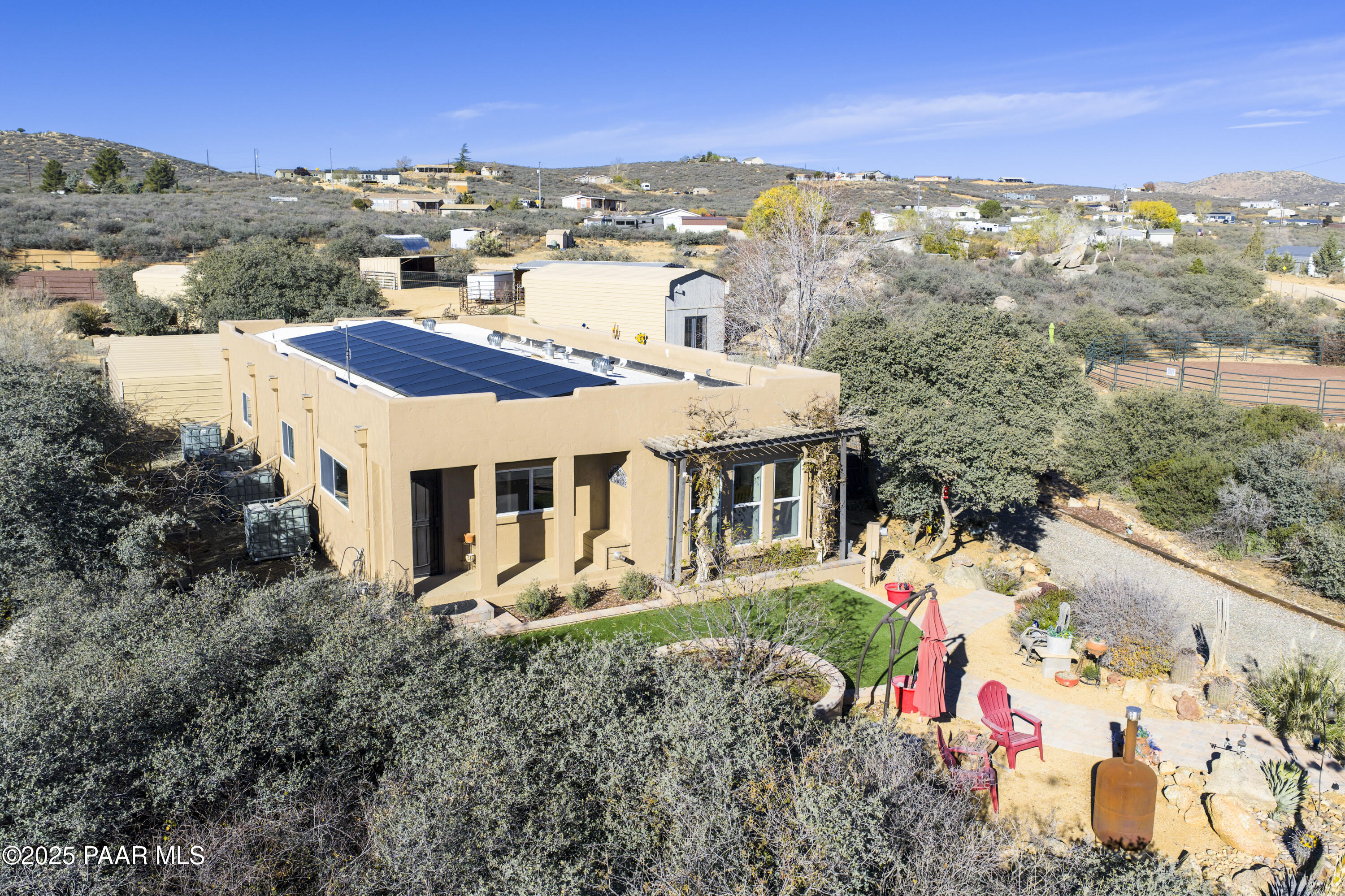 760 Yarber Wash Road Dewey, AZ 86327 - Photo 31 of 66 an aerial view of a house with a yard basket ball court and outdoor seating
