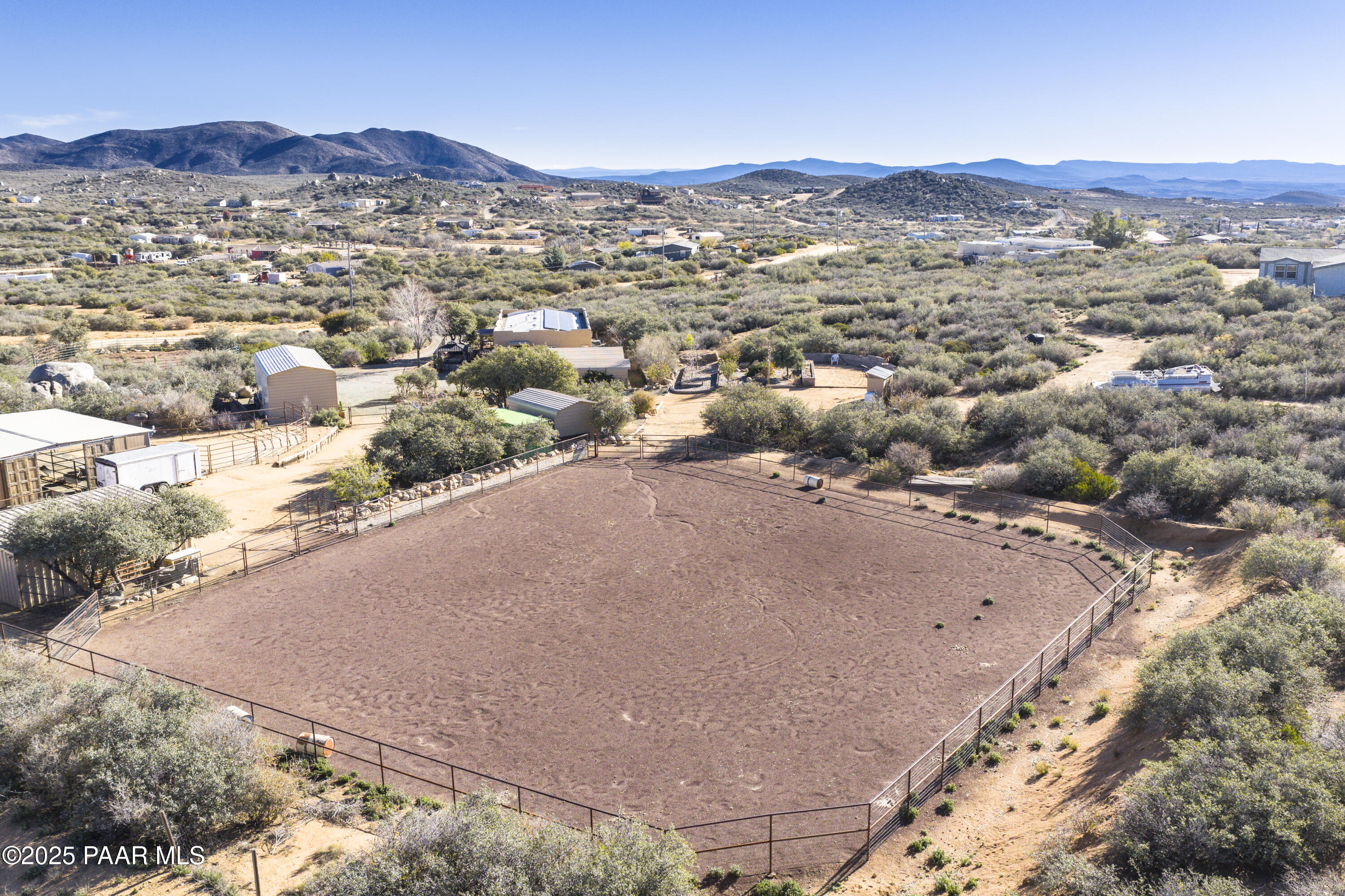 760 Yarber Wash Road Dewey, AZ 86327 - Photo 39 of 66 an aerial view of residential house and sandy dunes
