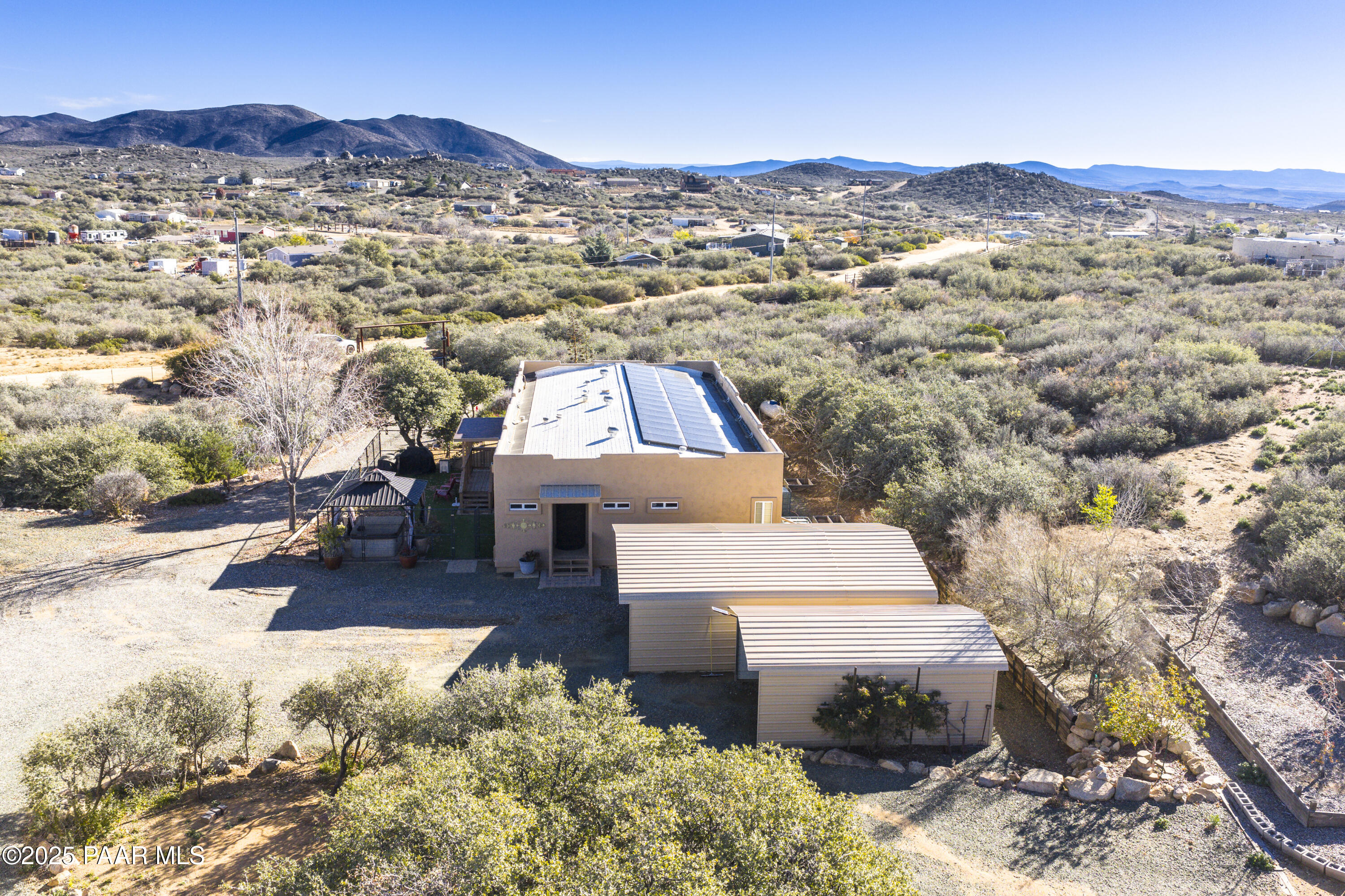 760 Yarber Wash Road Dewey, AZ 86327 - Photo 42 of 66 an aerial view of a house with a yard