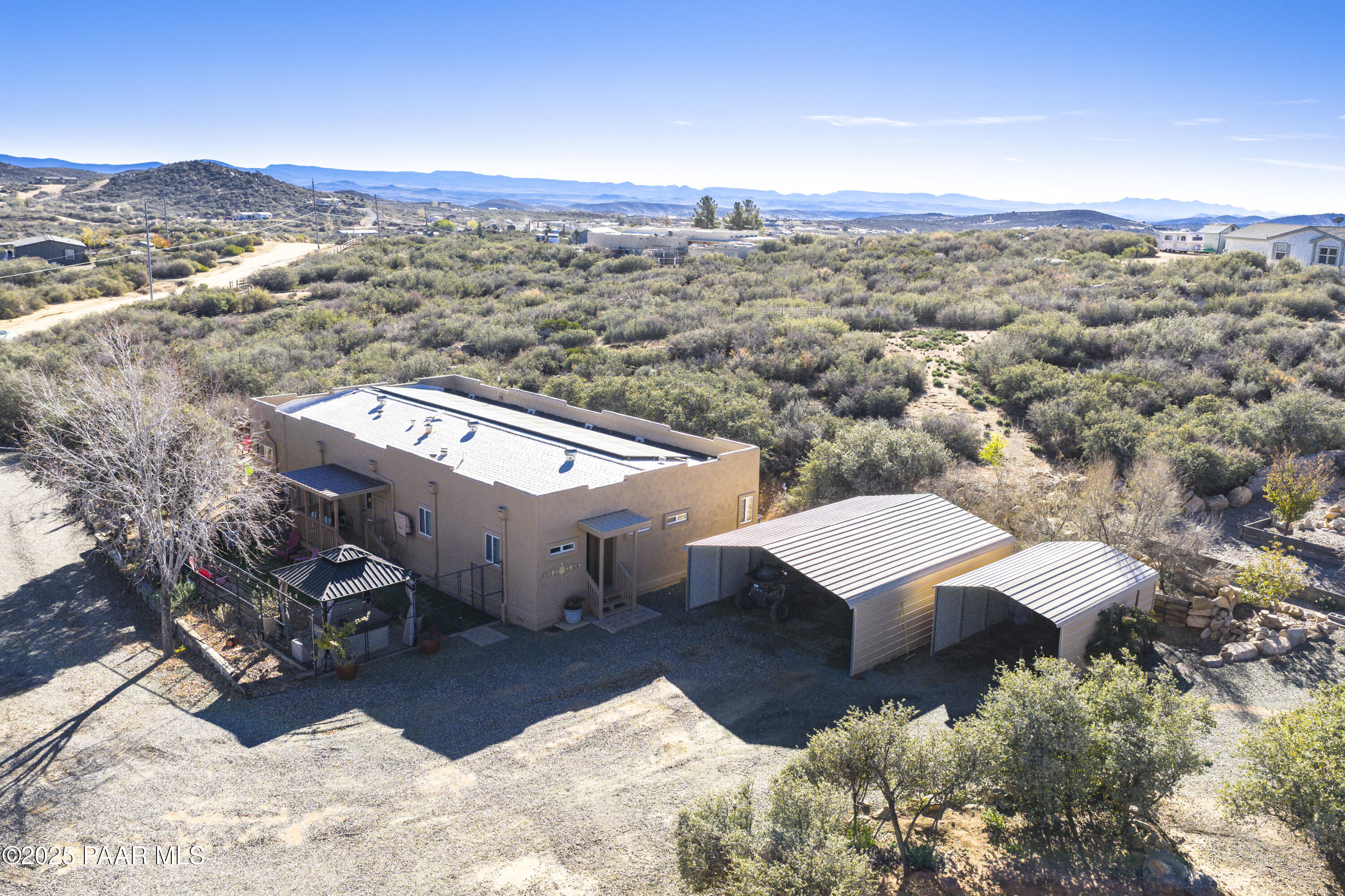 760 Yarber Wash Road Dewey, AZ 86327 - Photo 43 of 66 an aerial view of a house with a yard