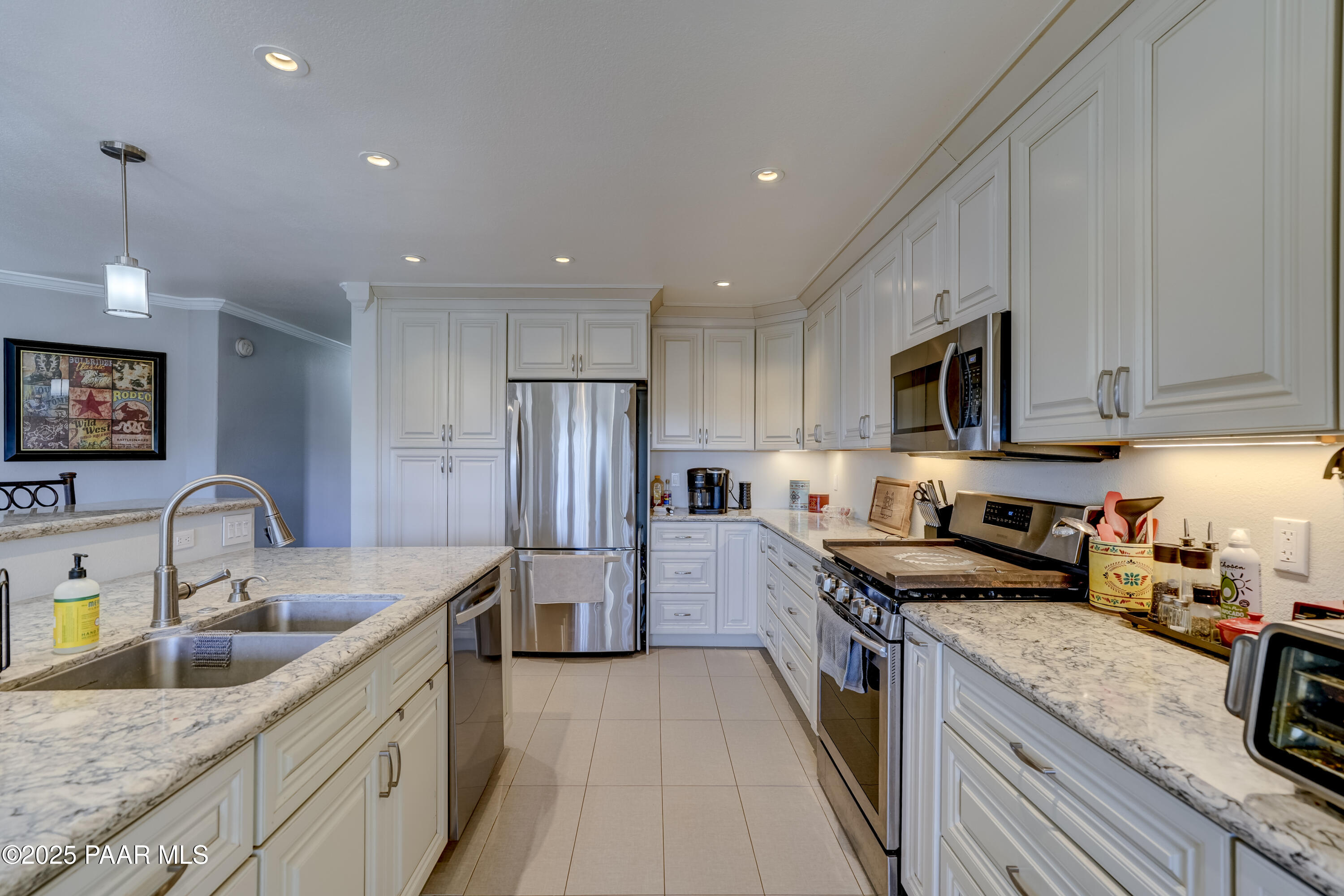 760 Yarber Wash Road Dewey, AZ 86327 - Photo 5 of 66 a kitchen with stainless steel appliances granite countertop a sink stove and refrigerator