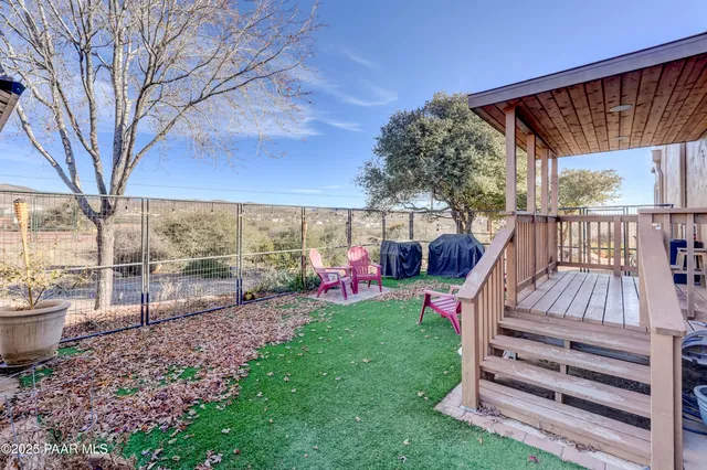 a view of a garage with wooden floor