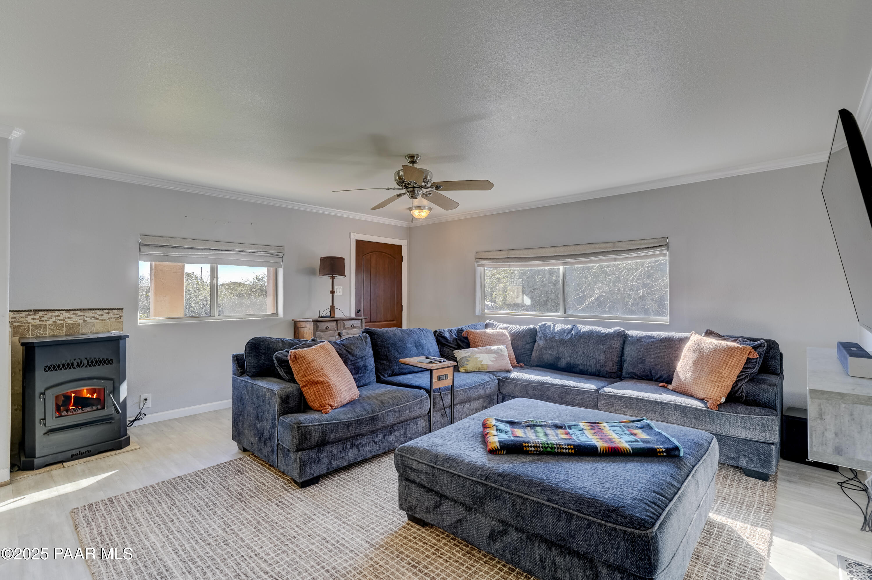 760 Yarber Wash Road Dewey, AZ 86327 - Photo 7 of 66 a living room with furniture and a fireplace