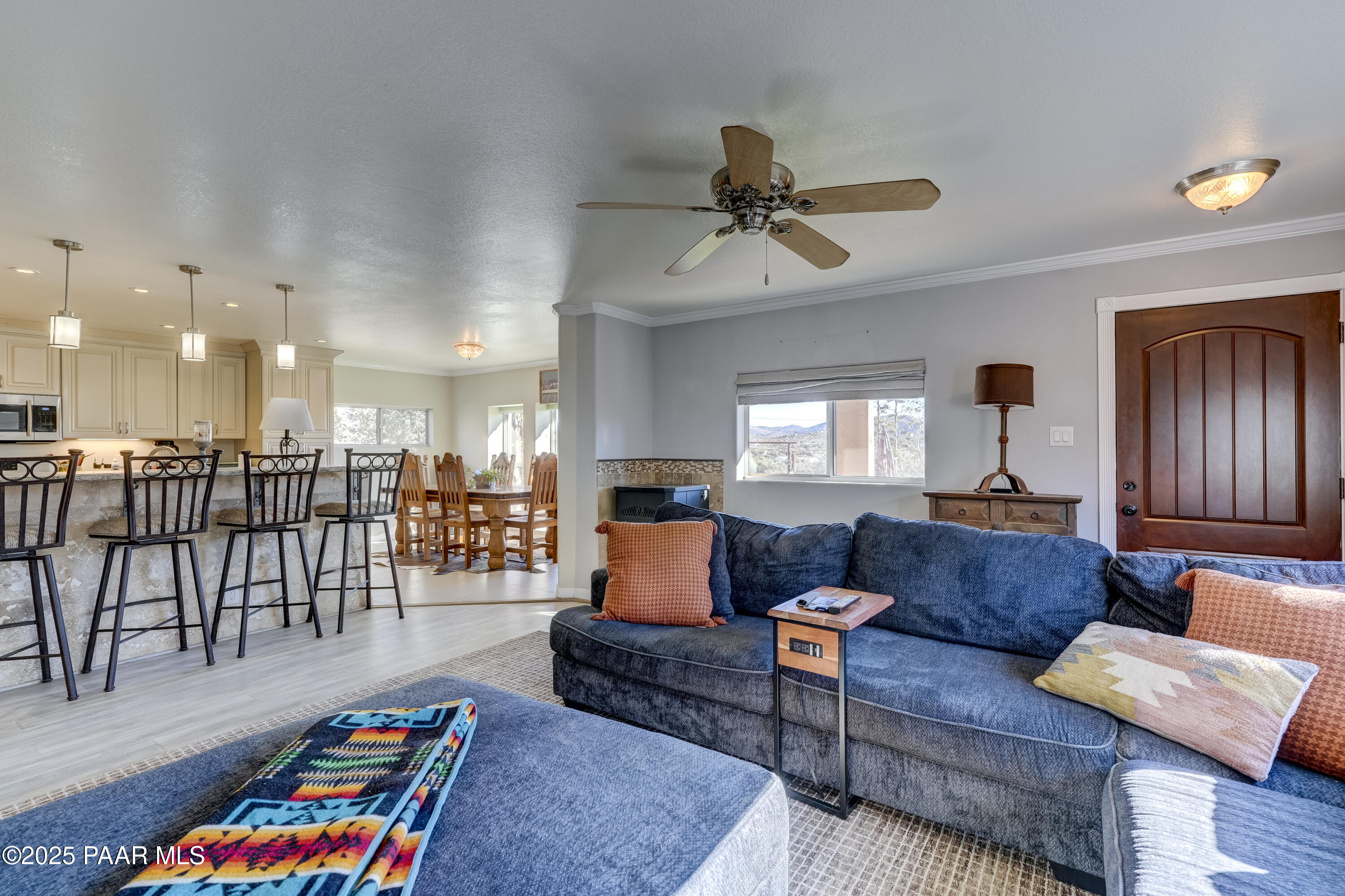 760 Yarber Wash Road Dewey, AZ 86327 - Photo 8 of 66 a living room with furniture and a wooden floor