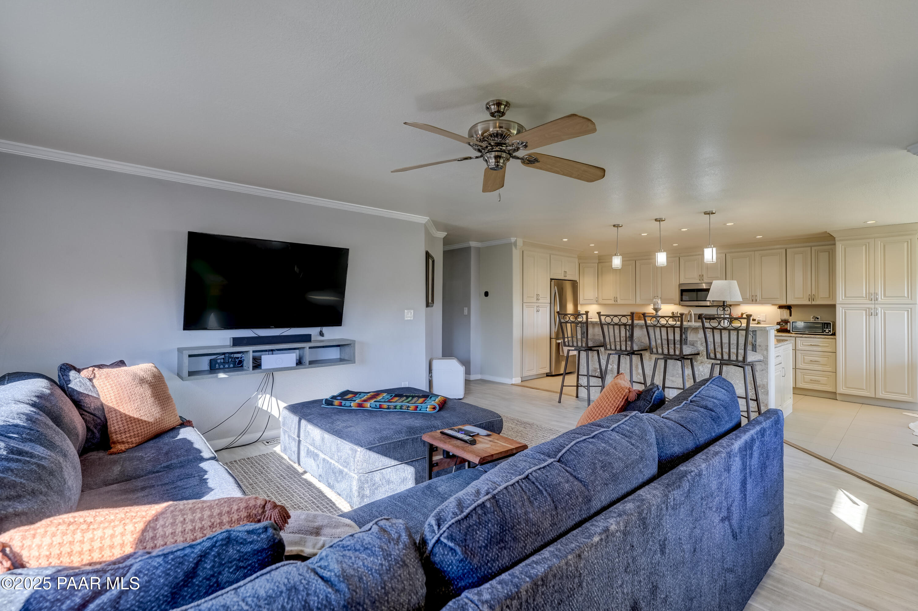 760 Yarber Wash Road Dewey, AZ 86327 - Photo 9 of 66 a living room with furniture and a flat screen tv