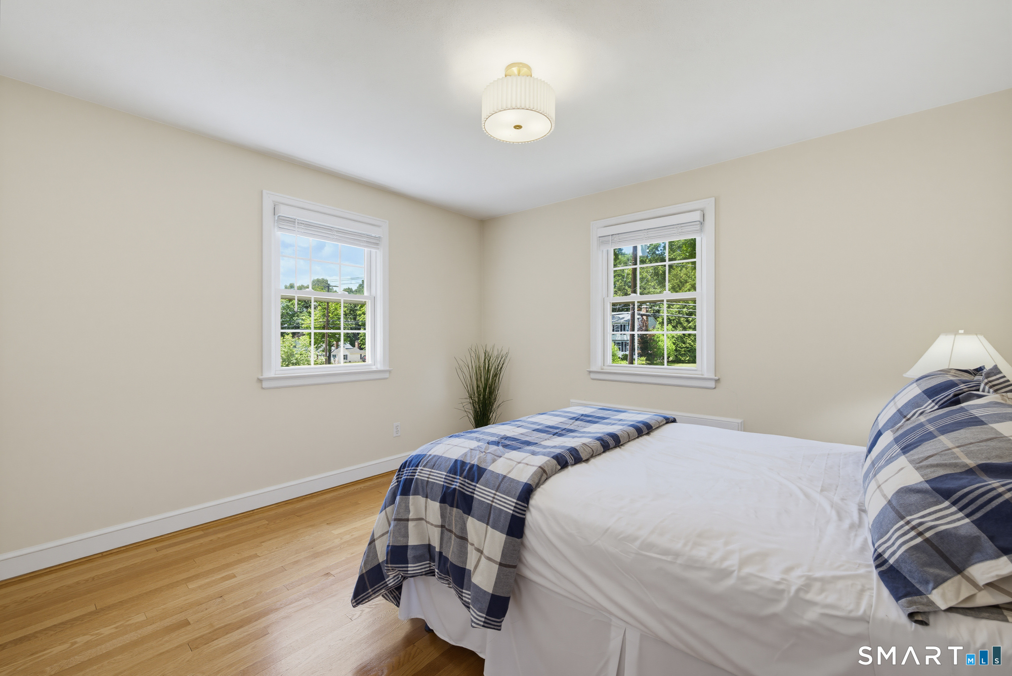 224 Spring Street Manchester, CT 06040 - Photo 25 of 39 a bedroom with a bed and a window