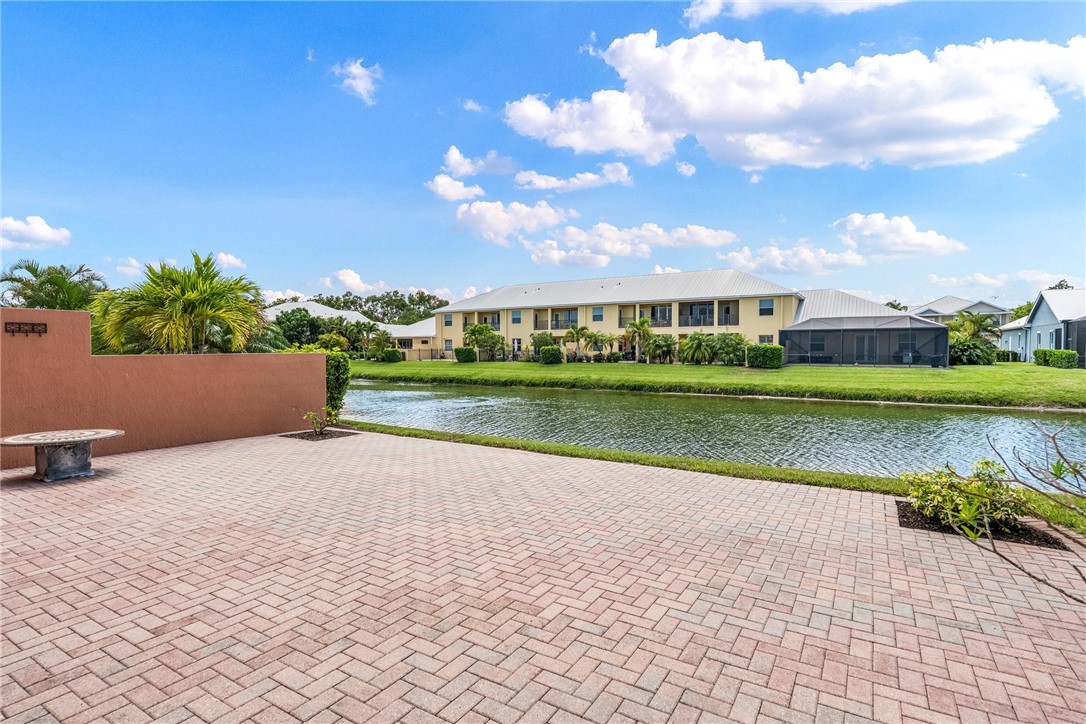 4565 Bridgepointe Way, Unit 142 Vero Beach, FL 32967 - Photo 5 of 36 a view of a terrace with a garden