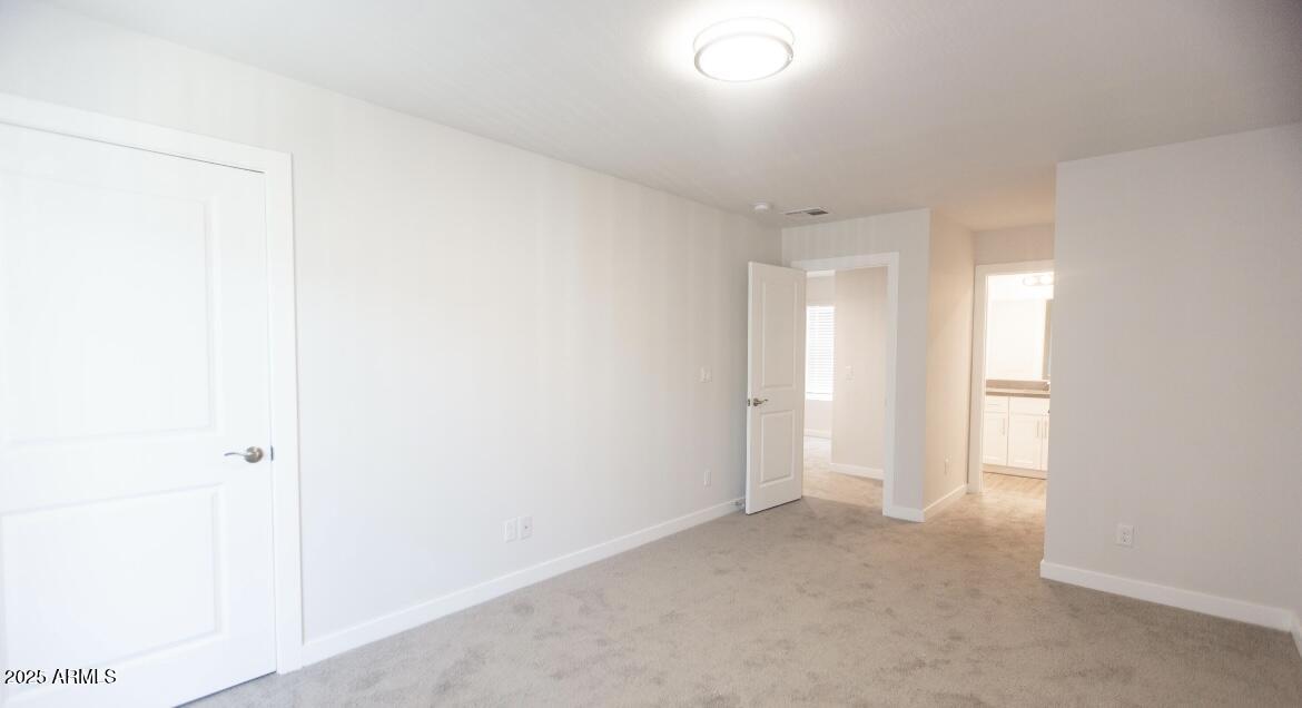 1850 North 51st Street, Unit 5 Phoenix, AZ 85008 - Photo 12 of 23 a view of an empty room