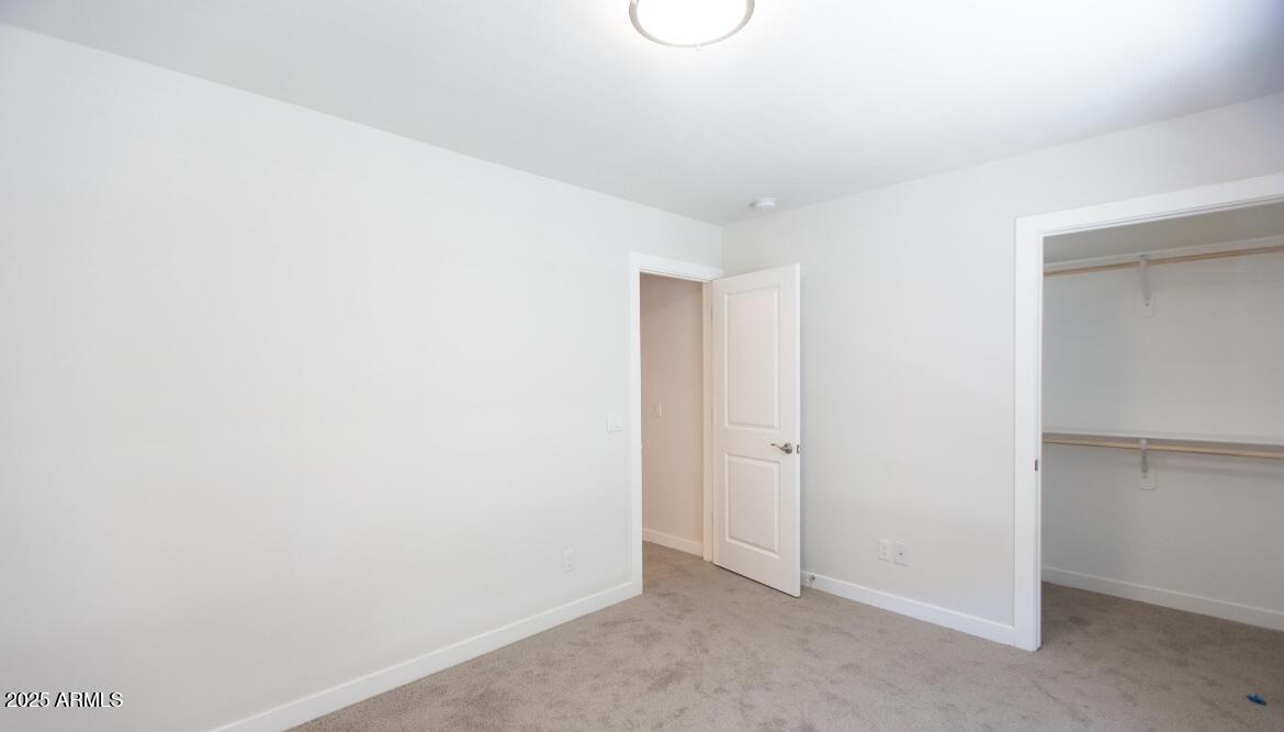 1850 North 51st Street, Unit 5 Phoenix, AZ 85008 - Photo 14 of 23 a view of an empty room