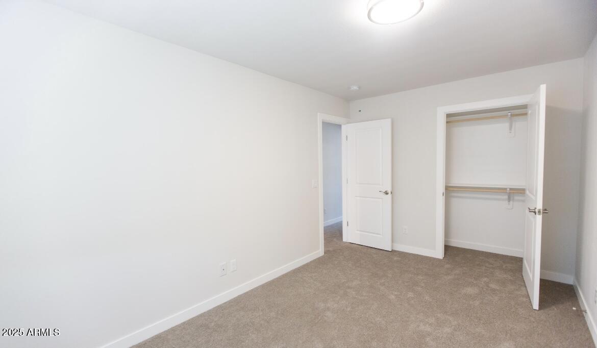 1850 North 51st Street, Unit 5 Phoenix, AZ 85008 - Photo 9 of 23 a view of an empty room